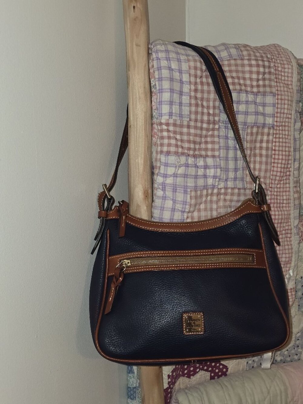 Dooney & Bourke Navy Blue Pebbled Leather Shoulder Bag With Brown Trim And Gold